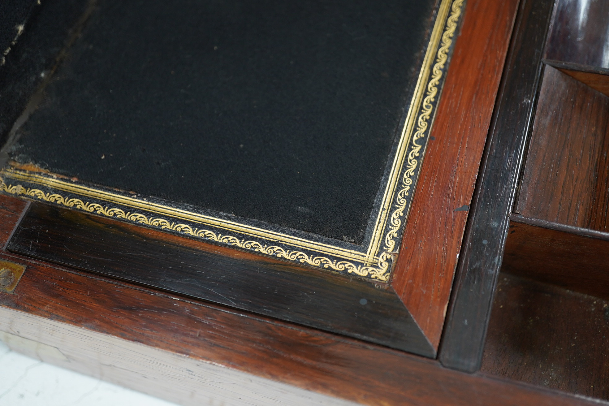 A mahogany brass mounted 19th century writing box and a walnut inlaid and mother of pearl writing box, brass mounted box, 35cm wide. Condition - exterior good, felt on slope torn.